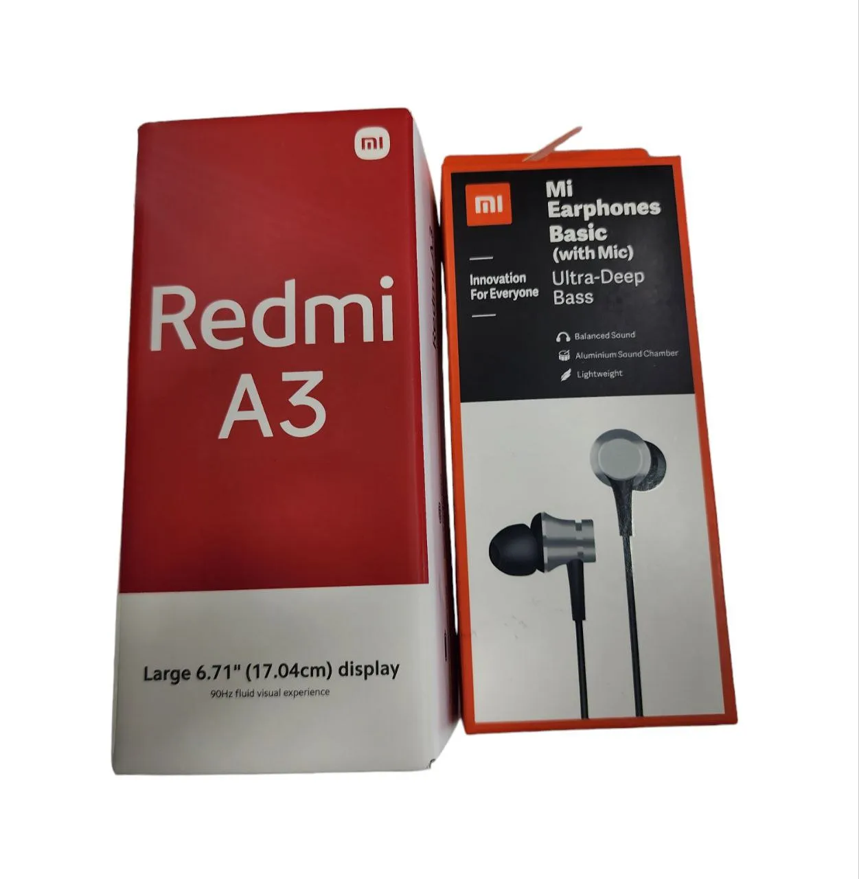  Celular Xiaomi Redmi A3 64G y 3RAM  + Auriculares MI earphones