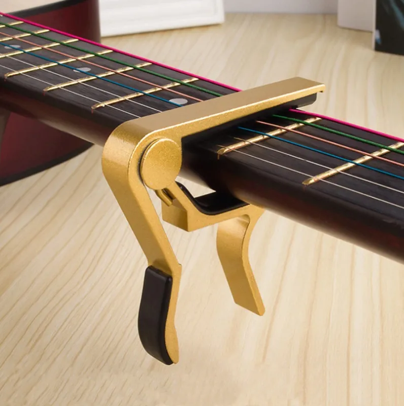 Capodastro Para Guitarra Profesional Capo Capotraste Cejilla Dorado 