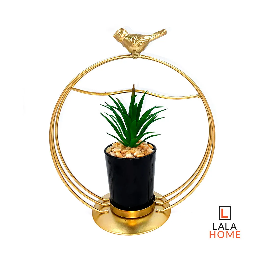 Planta Decorativa Con Base Metálica Circular Y Pajarito Dorado