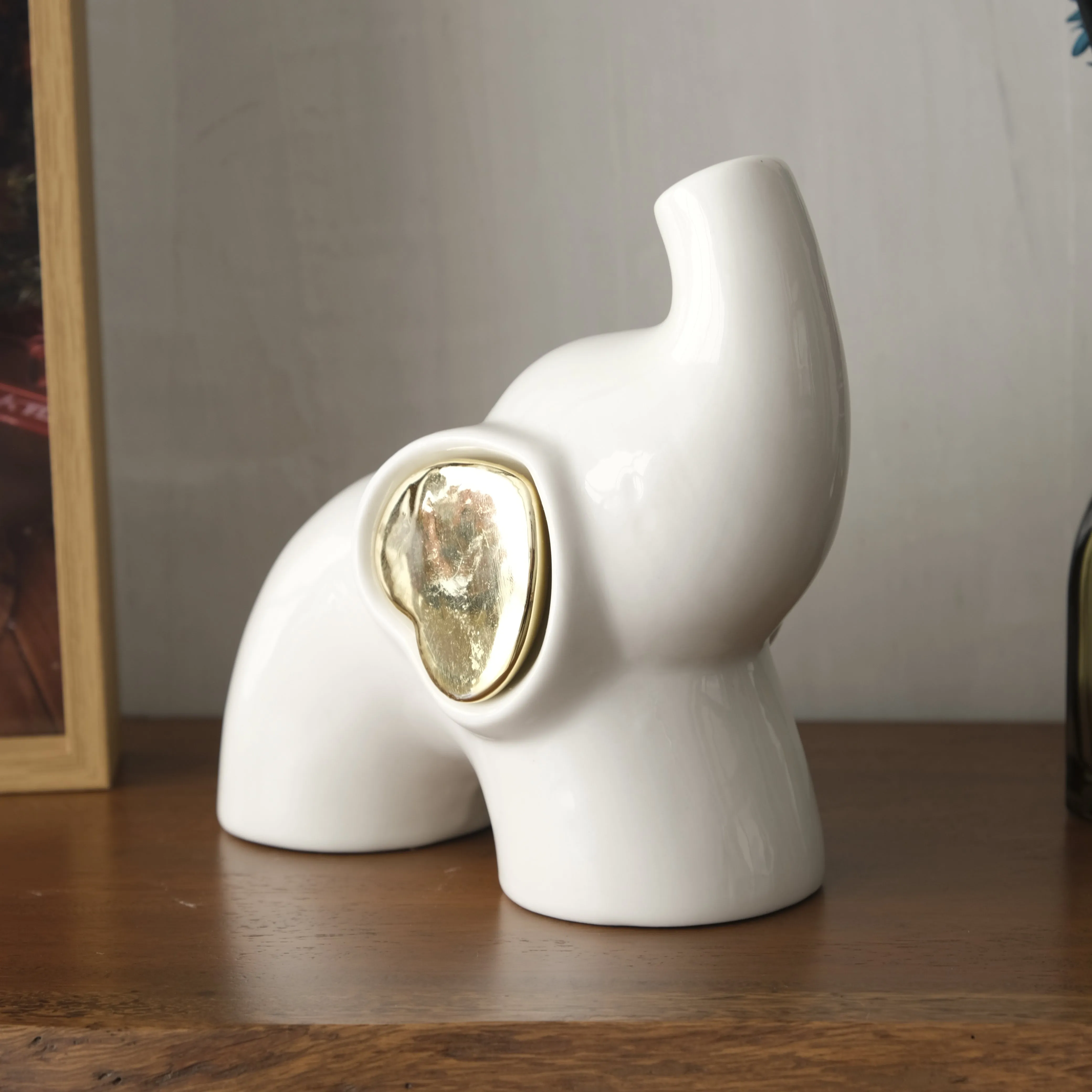 Elefante En Ceramica Blanco Con Dorado Lafe