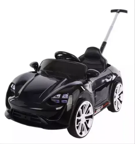 Carro Electrico Para Niños Con Guia Y Control Remoto Musica M-723