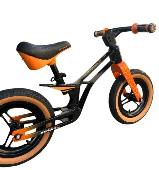 Bicicleta Balance Skadi Rin 12 Luxe Magnesio Negro/Naranja