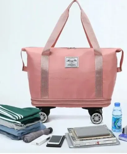 Bolso Viajero Eco Flex Plegable Con Ruedas Rosado